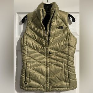 The North Face small 550 down vest metallic gold